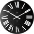Horloge murale en ABS, noir. Mouvement au quartz.